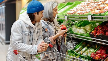 People shopping for vegetables